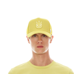 CULT OF INDIVIDUALITY CLEAN LOGO MESH BACK TRUCKER CURVED VISOR IN CANARY