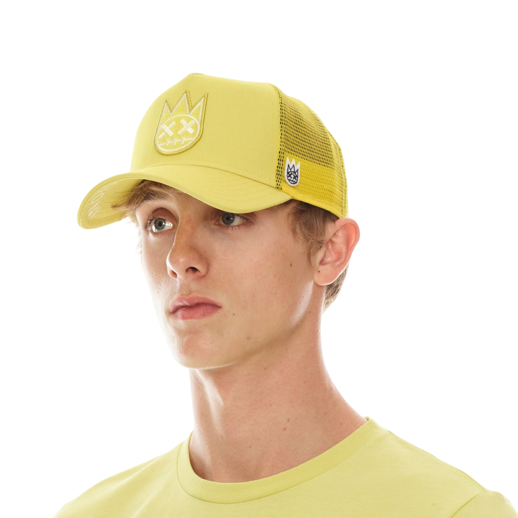 CULT OF INDIVIDUALITY CLEAN LOGO MESH BACK TRUCKER CURVED VISOR IN CANARY