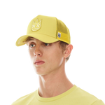 CULT OF INDIVIDUALITY CLEAN LOGO MESH BACK TRUCKER CURVED VISOR IN CANARY